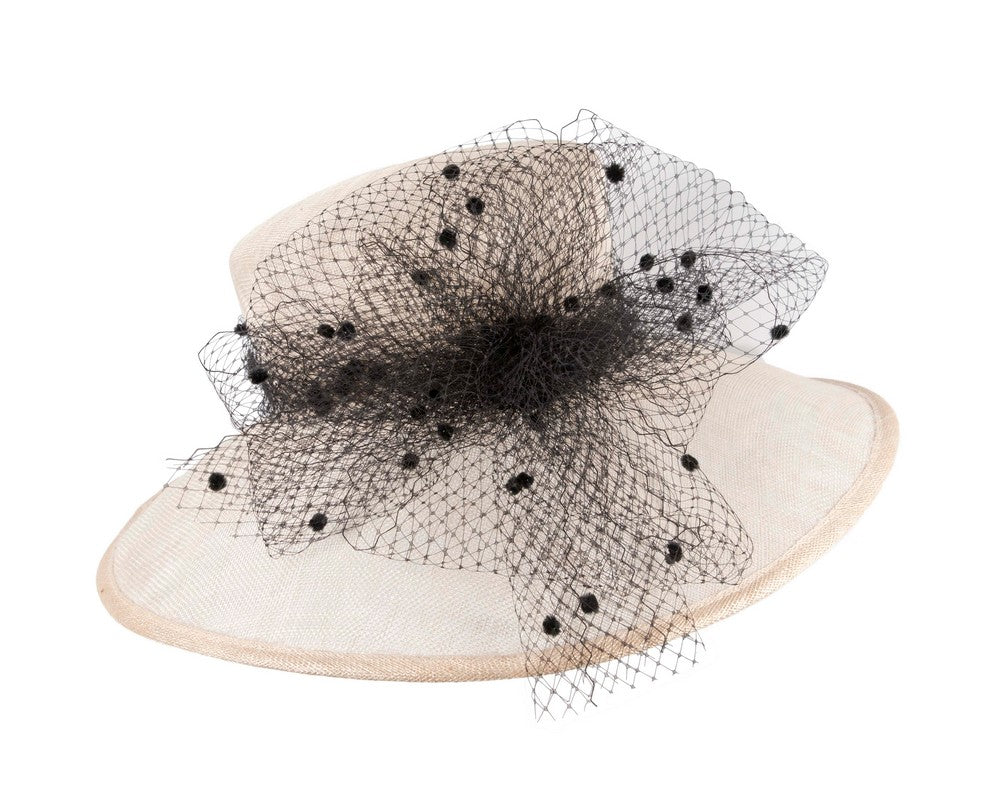 Wide brim cream and black hat